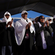 Ethiopians celebrate as they watch a live transmission of the Ethiopian ETRSS-1 Satellite launch into space at the Entoto Observatory and Research Center on the outskirts of Addis Ababa, Ethiopia Dec. 20, 2019.